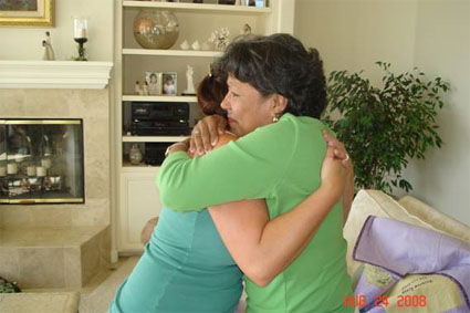 Irene hugs Lauren with a grateful heart